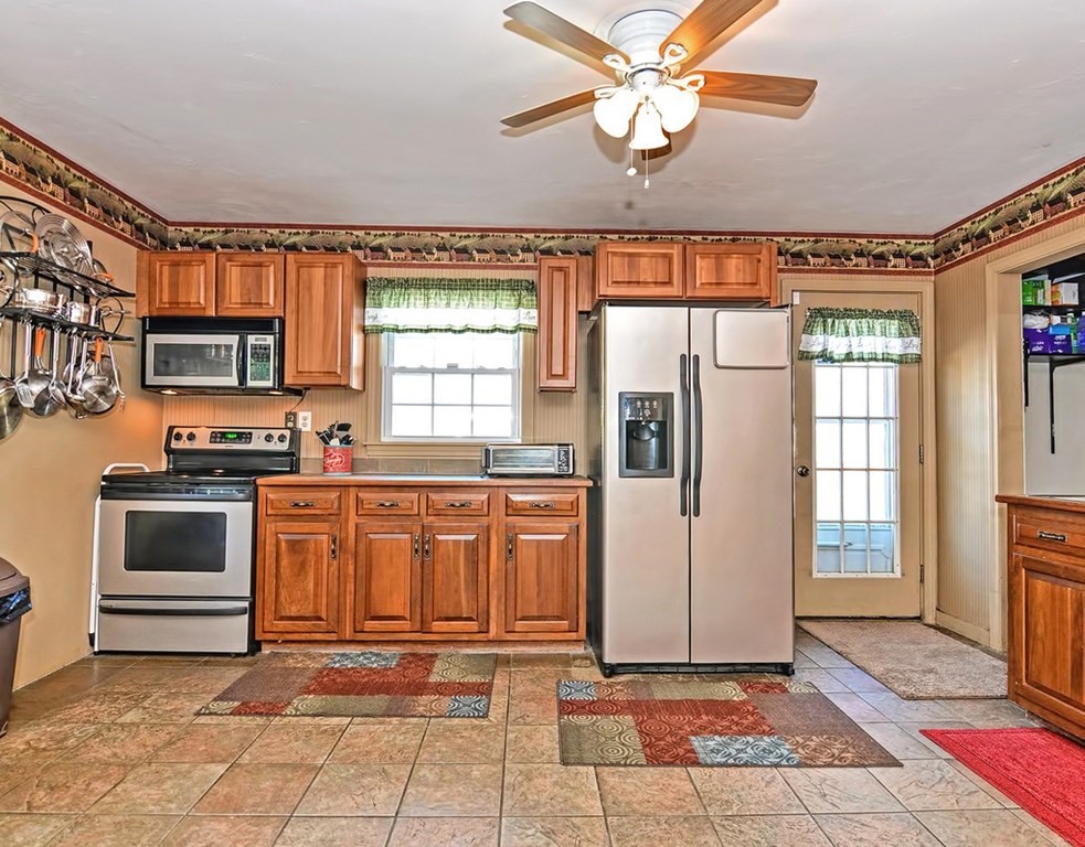 88 Rice Corner Road Brookfield, MA 01506 - Photo 14 of 39 a kitchen with stainless steel appliances granite countertop a refrigerator oven a sink and dishwasher