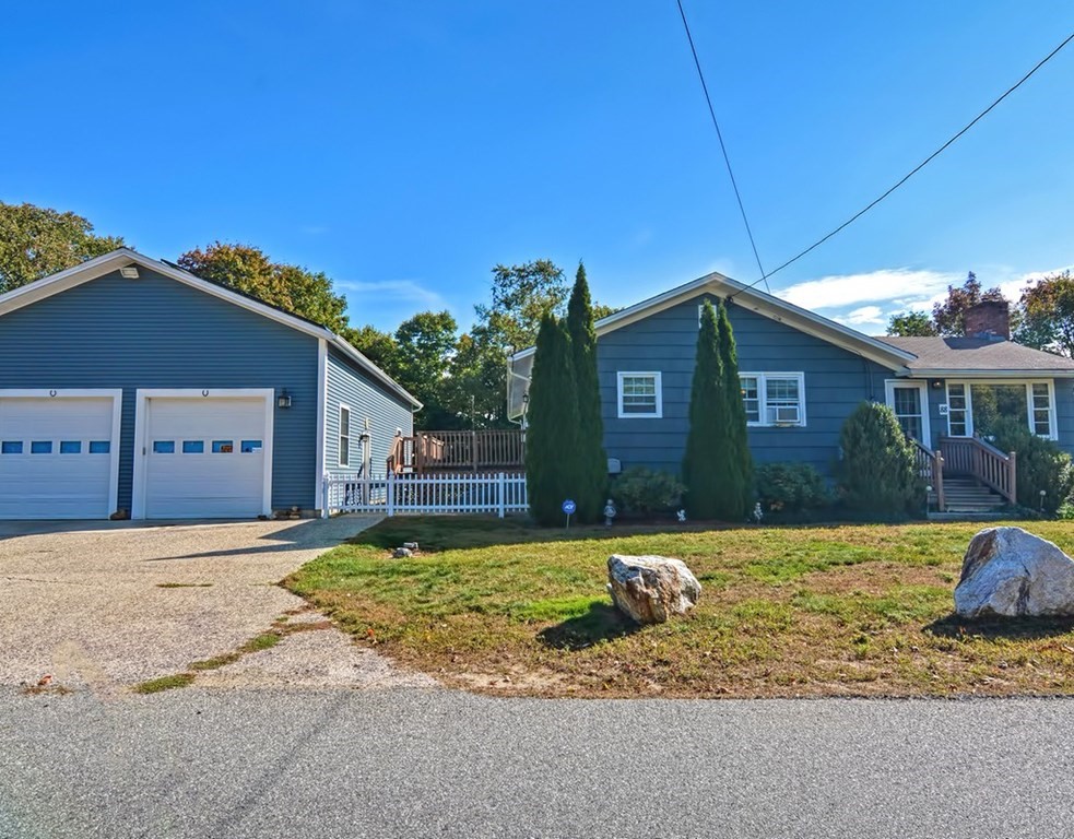 88 Rice Corner Road Brookfield, MA 01506 - Photo 2 of 39 a front view of a house with a yard