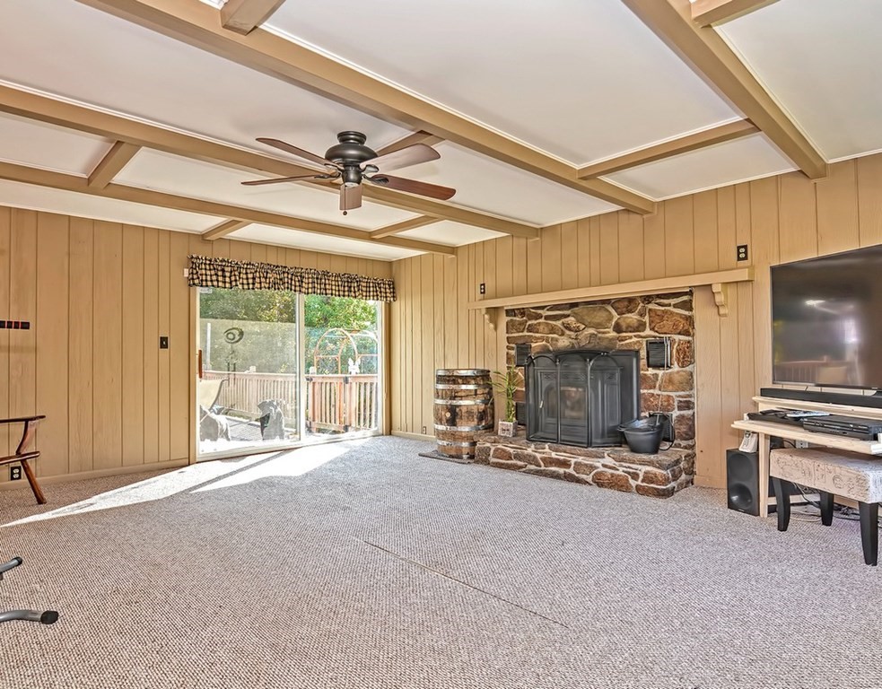 88 Rice Corner Road Brookfield, MA 01506 - Photo 21 of 39 a view of a livingroom with a fireplace and a window