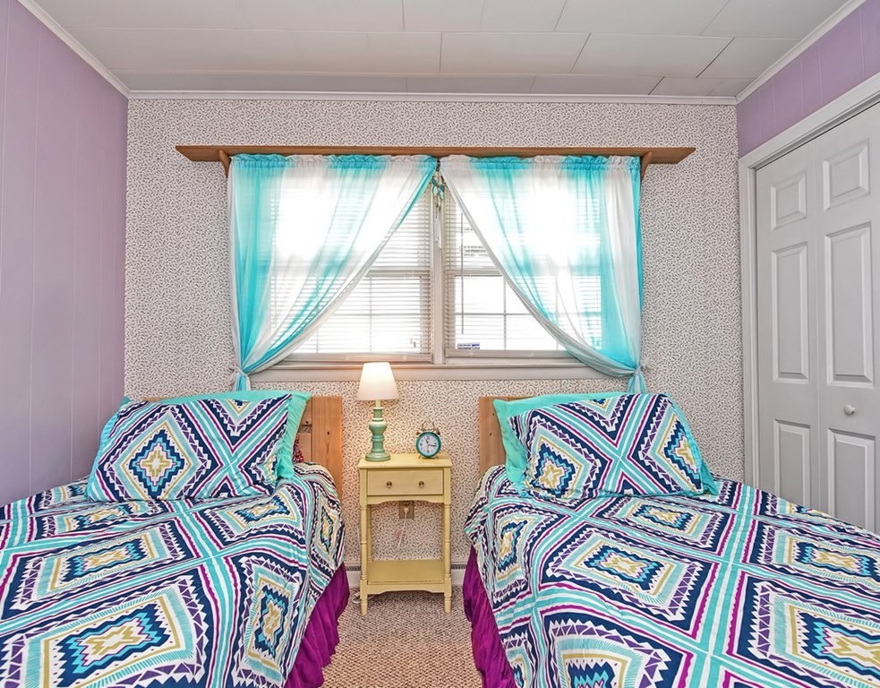 88 Rice Corner Road Brookfield, MA 01506 - Photo 24 of 39 a bedroom with a bed next to a window