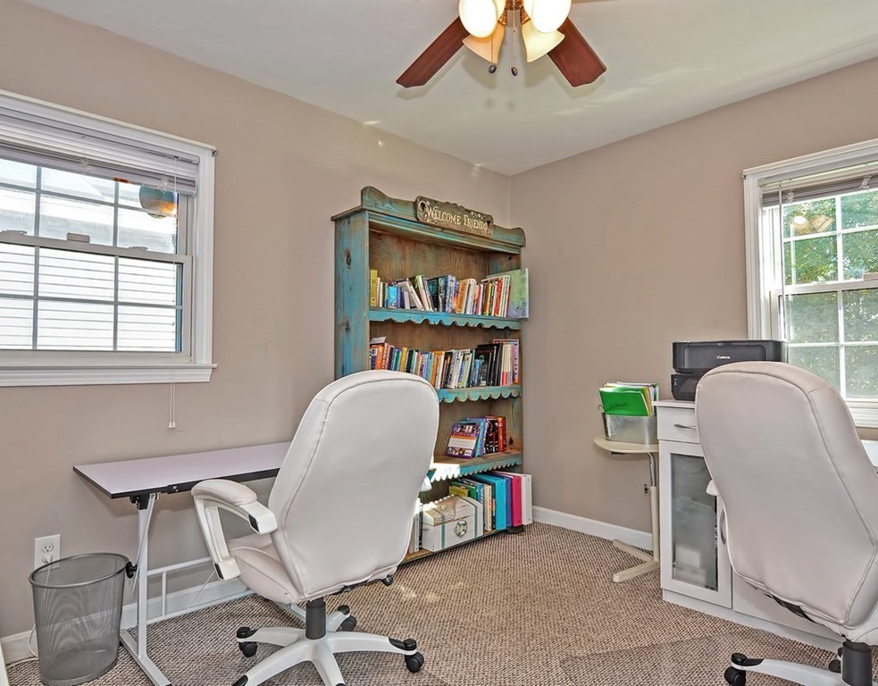 88 Rice Corner Road Brookfield, MA 01506 - Photo 26 of 39 a workspace with a bookshelf