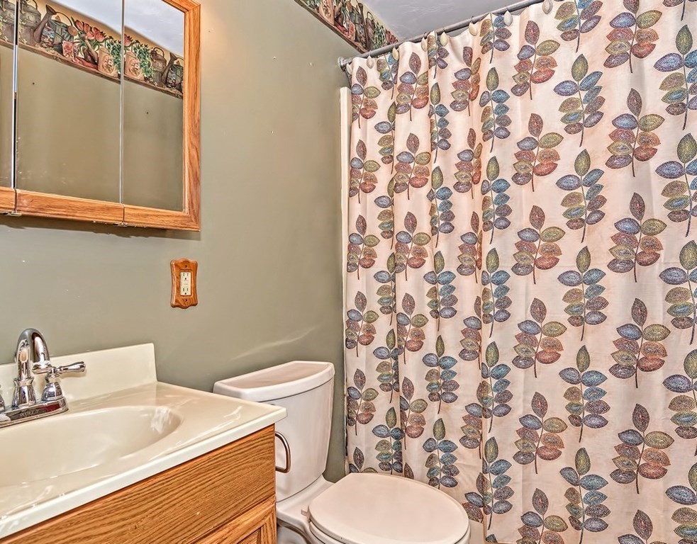 88 Rice Corner Road Brookfield, MA 01506 - Photo 33 of 39 a white toilet sitting next to a bathroom sink