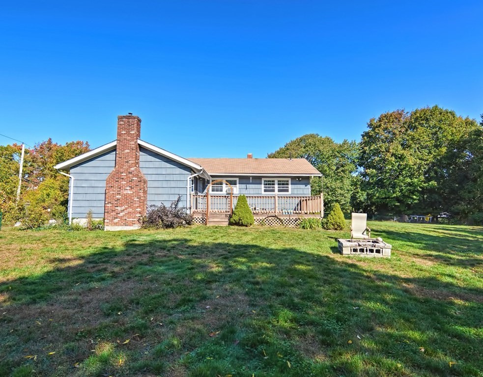 88 Rice Corner Road Brookfield, MA 01506 - Photo 8 of 39 a front view of a house with a yard