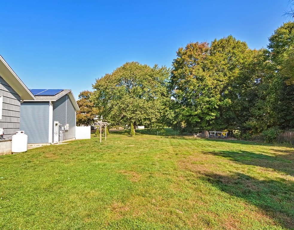 88 Rice Corner Road Brookfield, MA 01506 - Photo 10 of 39 a view of a yard with a house