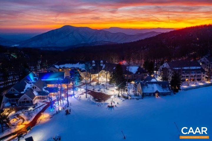 340 Chestnut Place Roseland, VA 22967 - Photo 23 of 26 a view of a balcony with swimming pool and outdoor seating