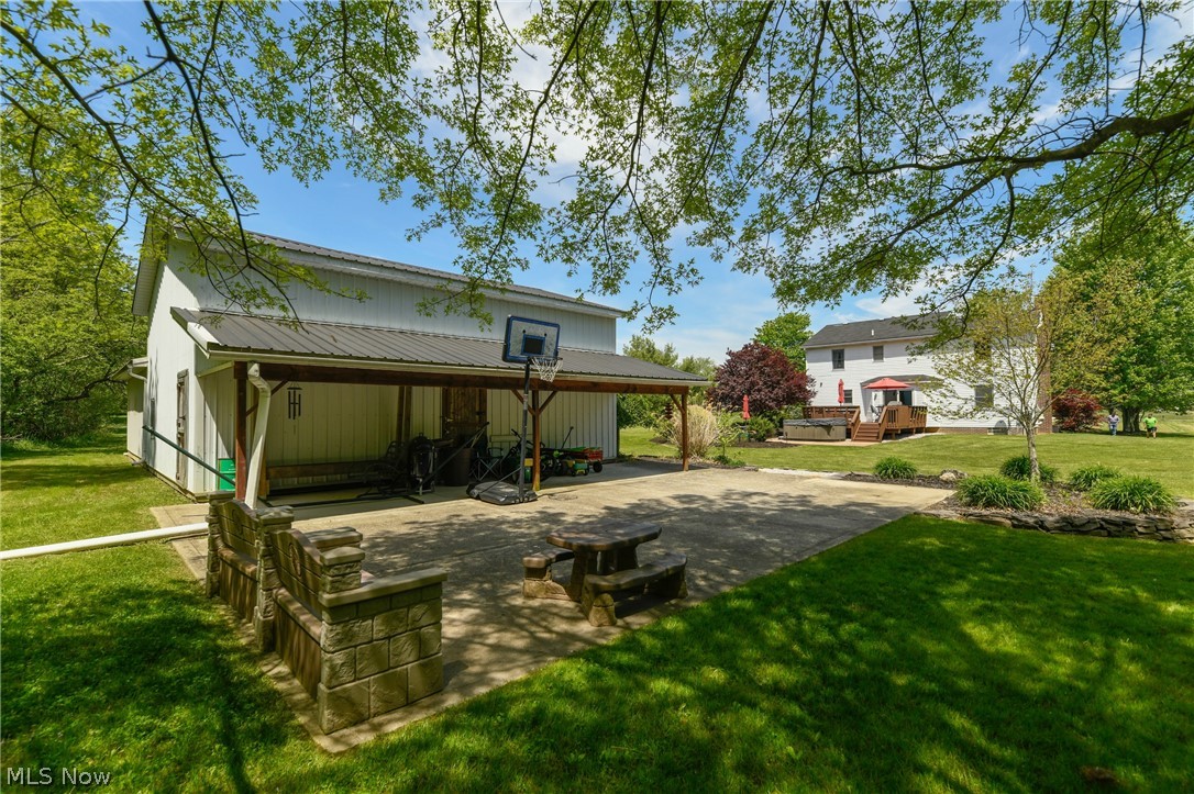 7810 Kennard Road Lodi, OH 44254 - Photo 29 of 35 Extra entertaining space off of the outbuilding.