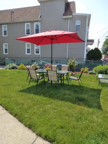 a view of a chairs in a yard