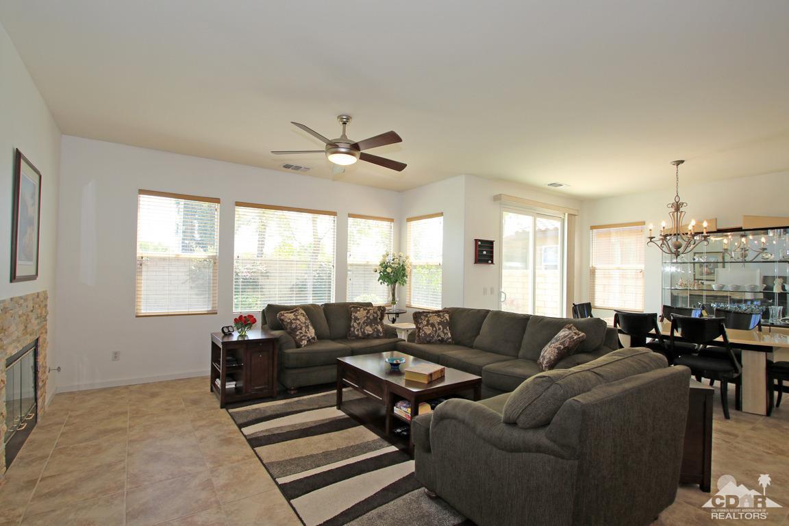 49898 Lewis Road Indio, CA 92201 - Photo 8 of 34 a living room with furniture and a large window