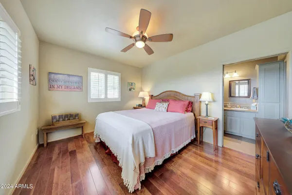 a kitchen with stainless steel appliances granite countertop a refrigerator a stove microwave and cabinets