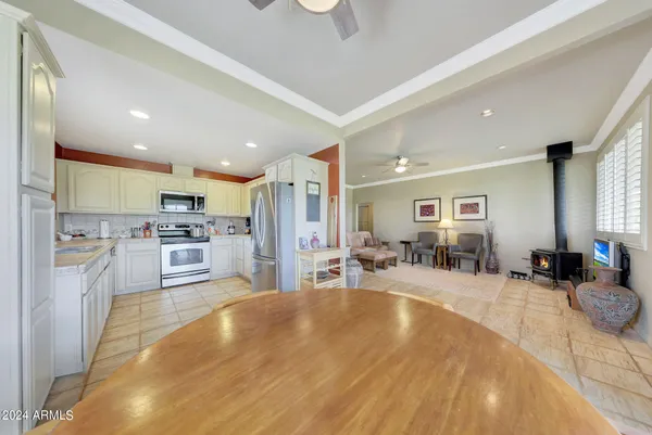 a view of a tree in the middle of a yard