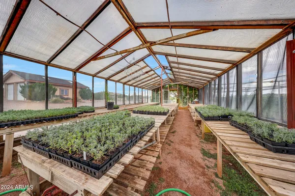 a view of a backyard with porch