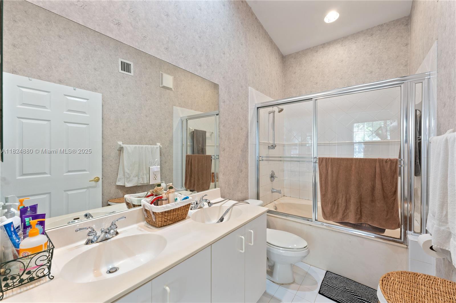 18739 Southwest 28th Street Miramar, FL 33029 - Photo 9 of 15 a bathroom with a sink toilet vanity and shower