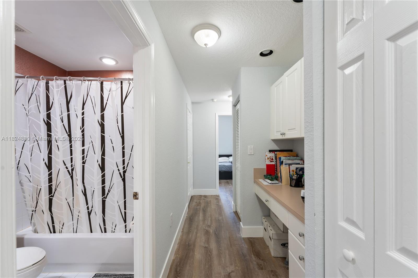 18739 Southwest 28th Street Miramar, FL 33029 - Photo 10 of 15 a view of walk in closet with clothes and shoes