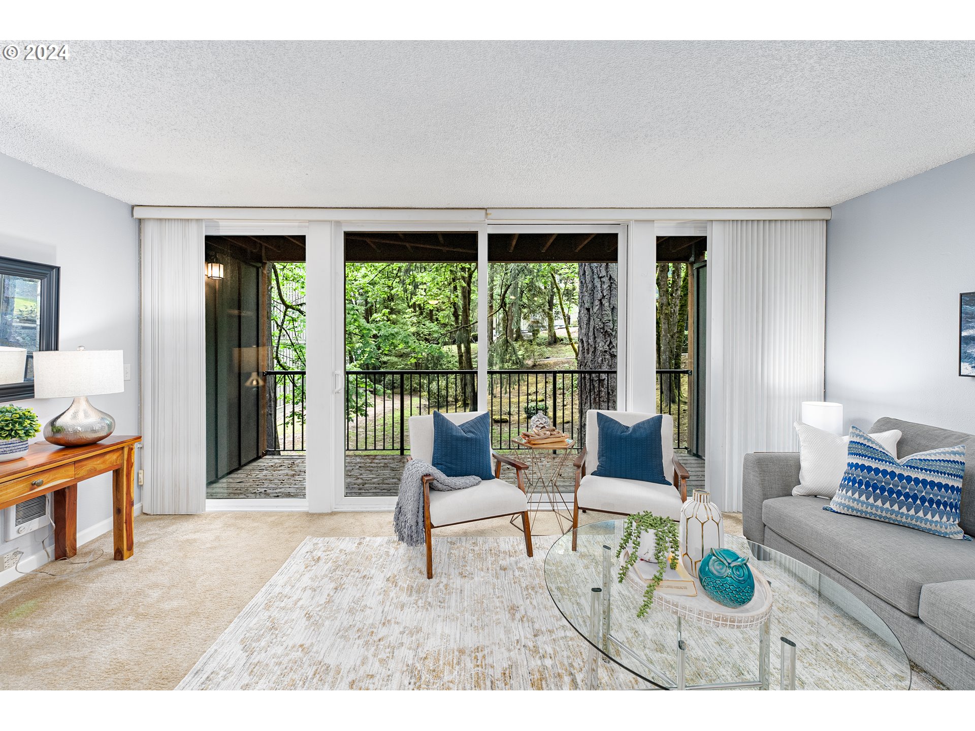 100 Kerr Parkway, Unit 32 Lake Oswego, OR 97035 - Photo 6 of 33 a living room with furniture and a large window