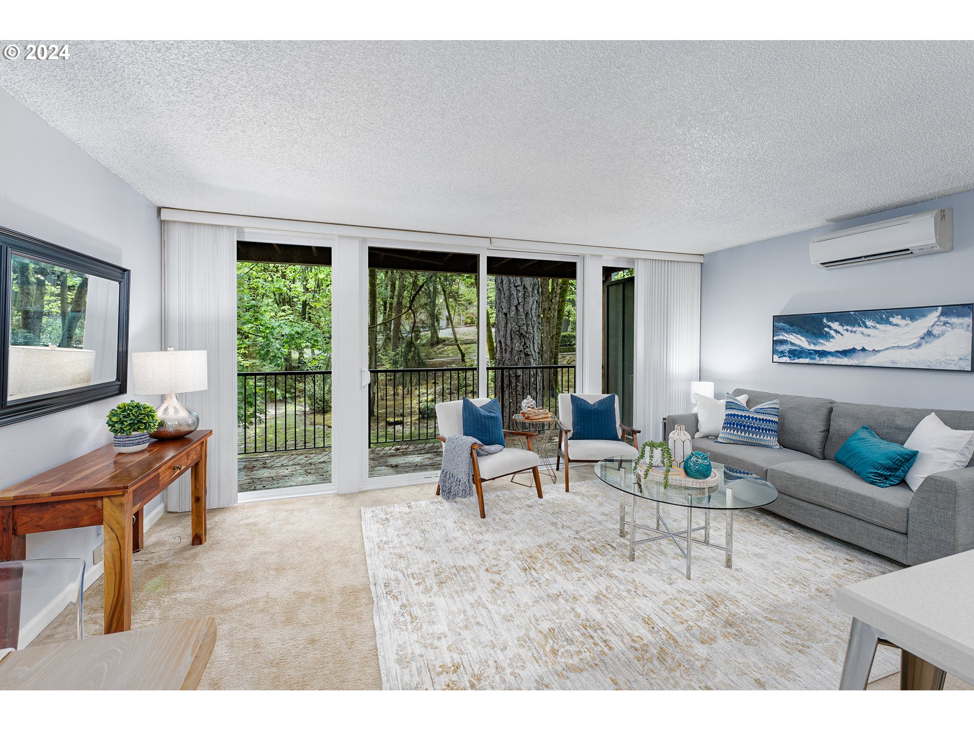 100 Kerr Parkway, Unit 32 Lake Oswego, OR 97035 - Photo 7 of 33 a living room with furniture and a large window