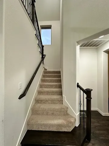 an empty room with a bench