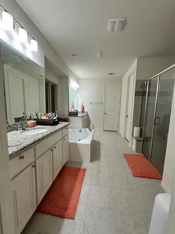 a room with a bed and a chair