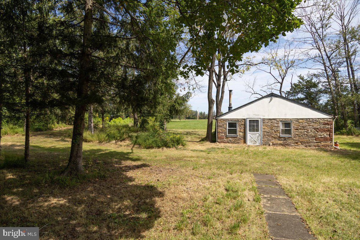 508 Telegraph Road Perkasie, PA 18944 - Photo 10 of 21 a yellow house with trees in front of it