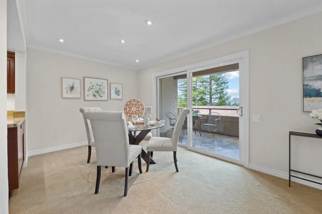 a bathroom with a granite countertop sink toilet a large mirror a bathtub and shower