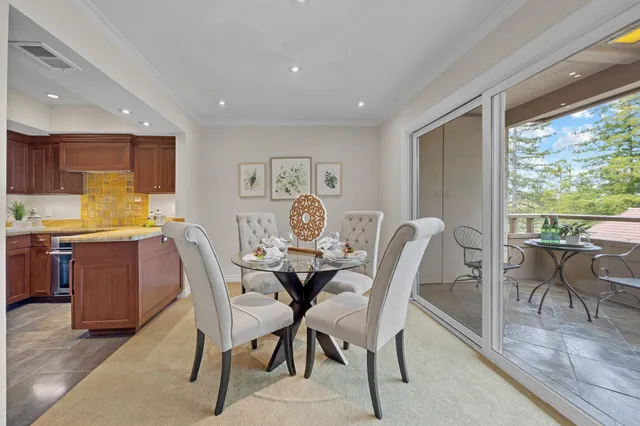 a spacious bedroom with a bed and a table in it