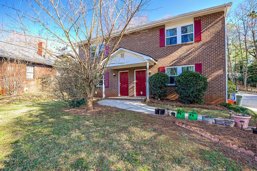 a view of house with outdoor space and porch