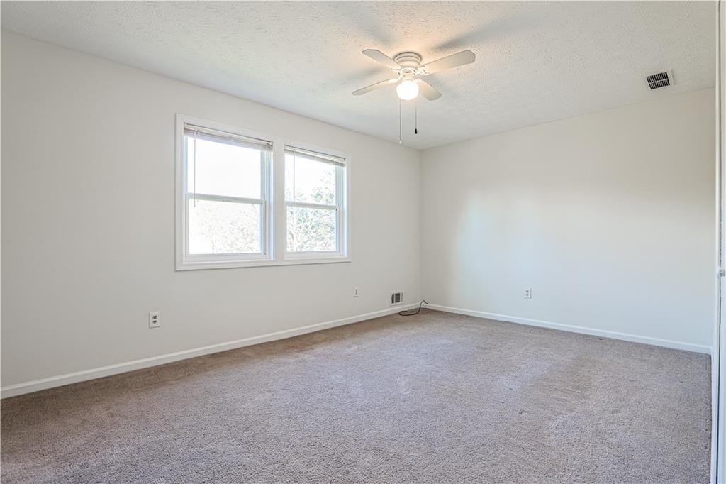 732 South Candler Street Decatur, GA 30030 - Photo 12 of 29 an empty room with a window