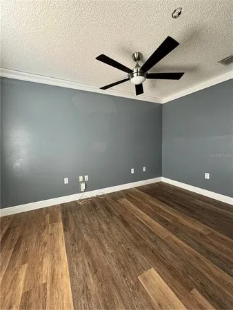 a view of a big room with wooden floor