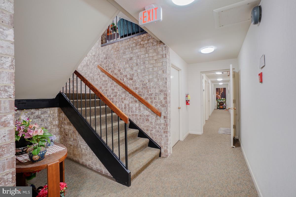 3314 Chiswick Court, Unit 621G Silver Spring, MD 20906 - Photo 5 of 19 Secondary exit down the hallway