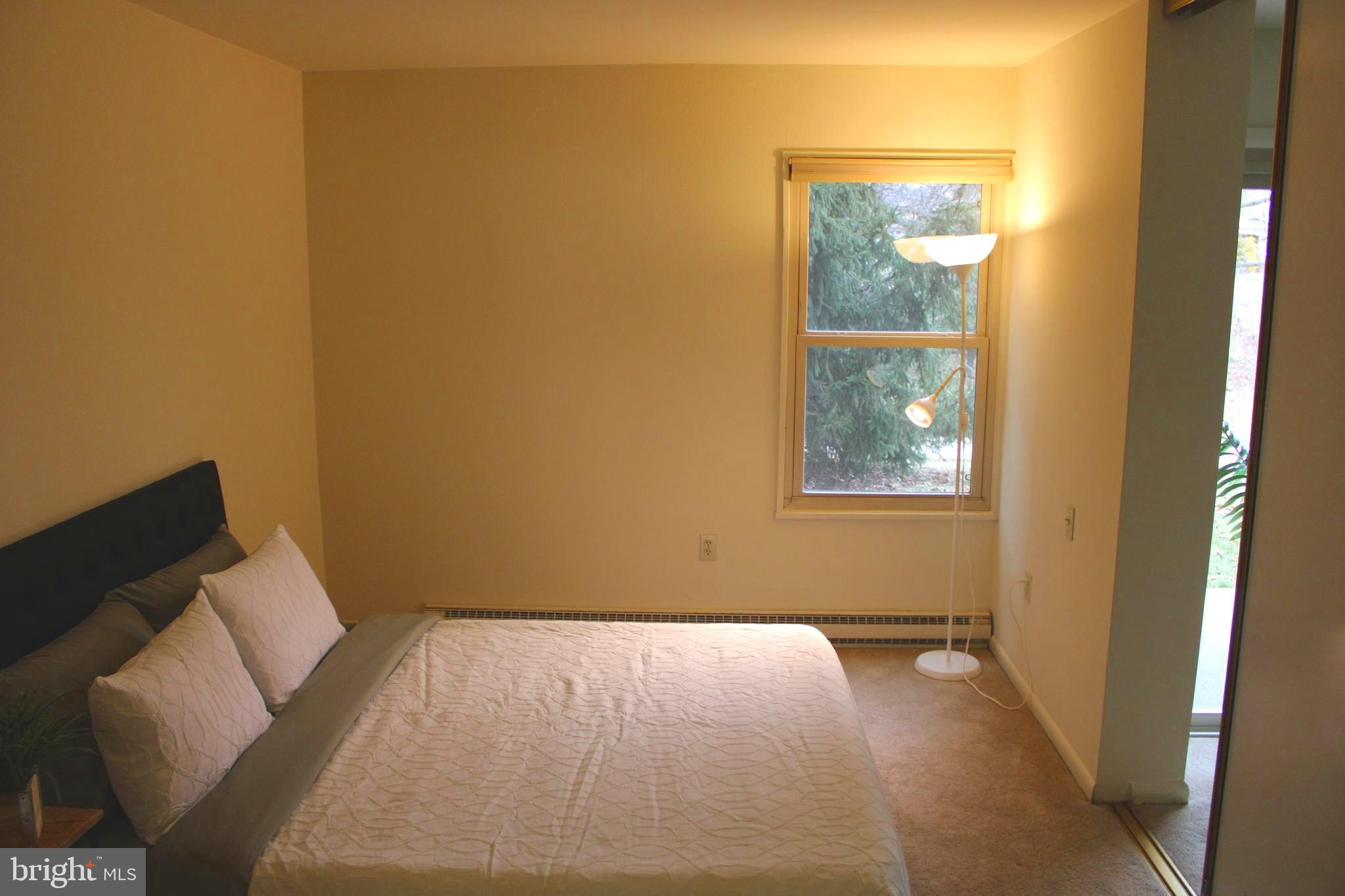 3314 Chiswick Court, Unit 621G Silver Spring, MD 20906 - Photo 9 of 19 Sleeping area with queen sized bed