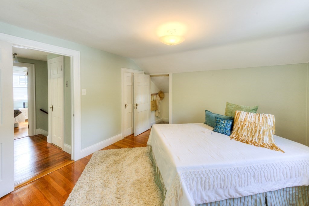 197 Eastern Avenue Worcester, MA 01605 - Photo 31 of 42 a bedroom with a bed and a couch