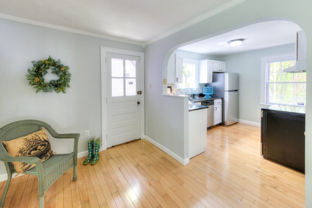 197 Eastern Avenue Worcester, MA 01605 - Photo 10 of 42 a kitchen with a sink and wooden floor