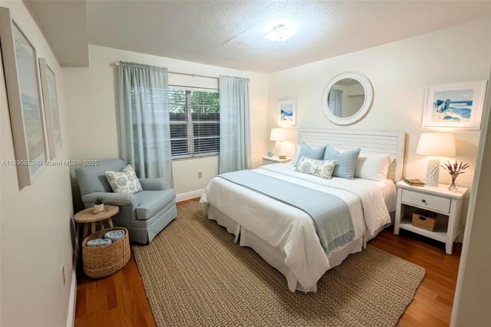 1856 Opechee Drive, Unit 2 Miami, FL 33133 - Photo 7 of 15 a bedroom with bed and a large window