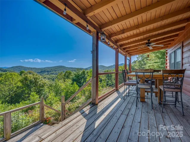 a view of a chairs and table on the wooden floor