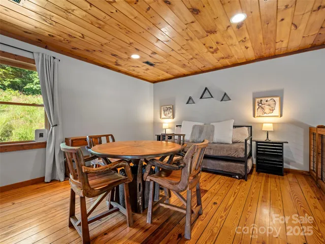 a view of a living room with a flat screen tv