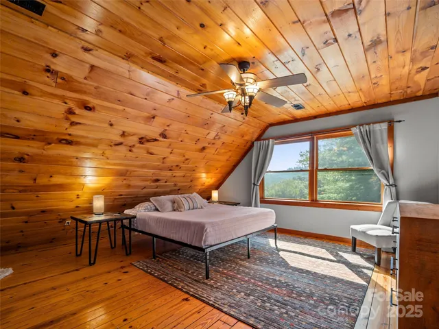 a room with furniture and a wooden floor