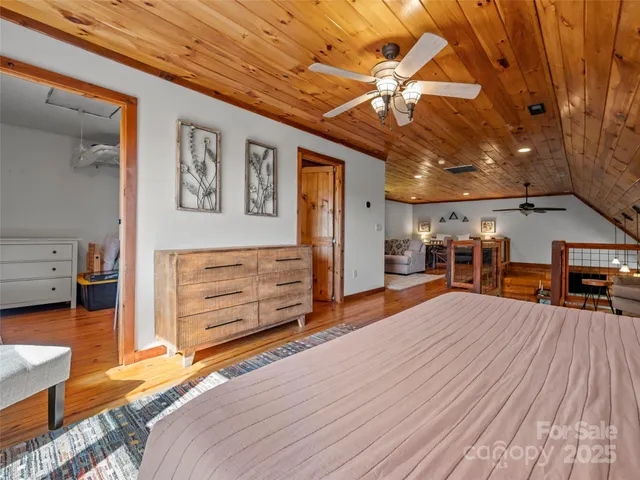 a kitchen with stainless steel appliances a sink stove and cabinets