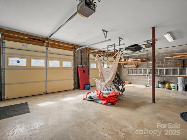 a room with a bed and a dresser