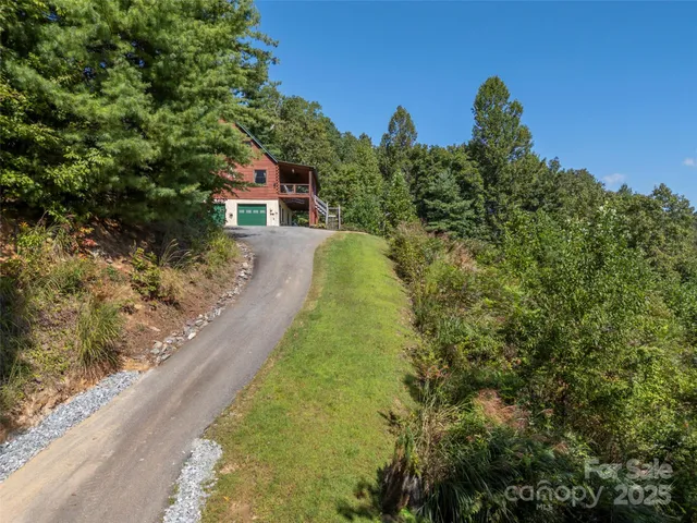 a view of a back yard of the house