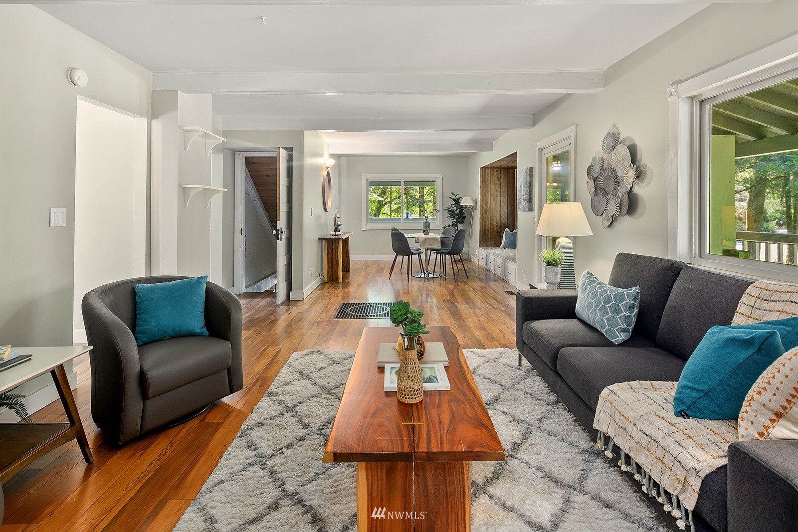 18416 Southeast Petrovitsky Road Renton, WA 98058 - Photo 18 of 36 a living room with furniture and a wooden floor