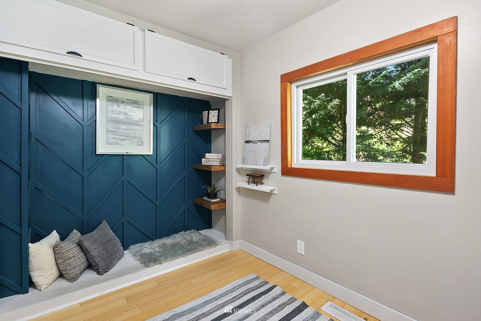18416 Southeast Petrovitsky Road Renton, WA 98058 - Photo 20 of 36 a bedroom with a bed and a window