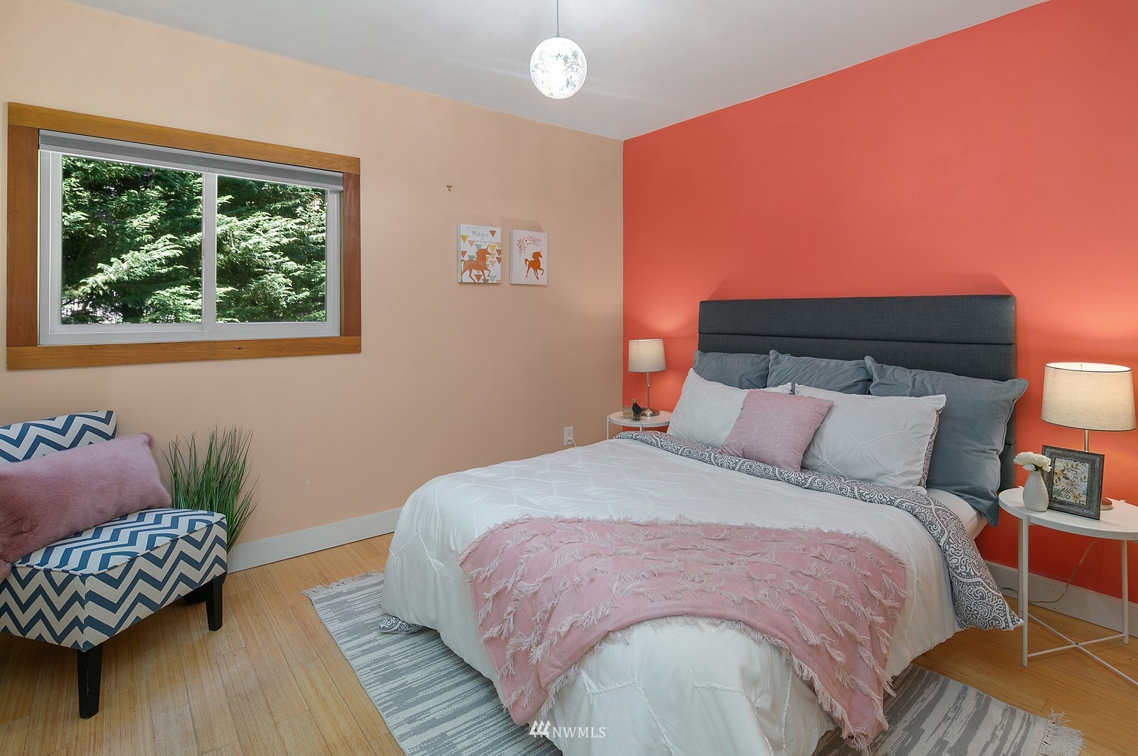 18416 Southeast Petrovitsky Road Renton, WA 98058 - Photo 21 of 36 a bedroom with a bed and window