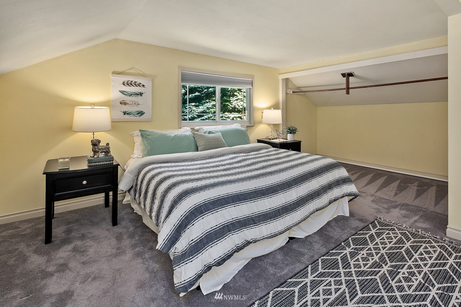 18416 Southeast Petrovitsky Road Renton, WA 98058 - Photo 23 of 36 a bedroom with a bed and wooden floor