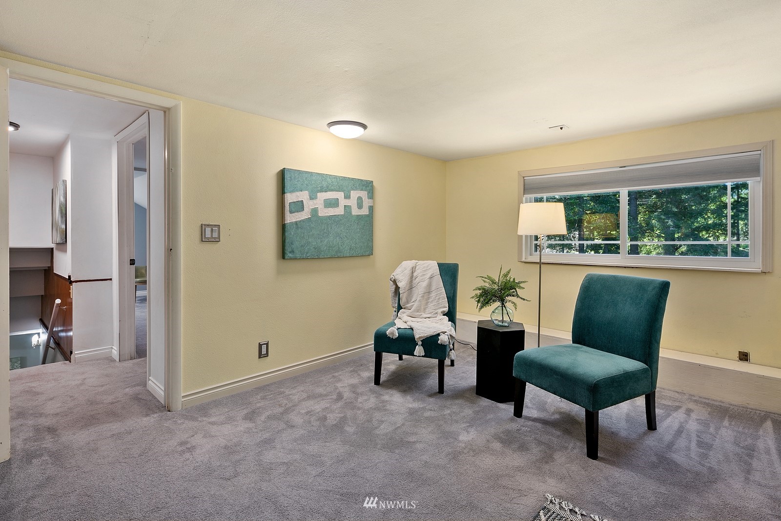 18416 Southeast Petrovitsky Road Renton, WA 98058 - Photo 24 of 36 a living room with furniture and a window
