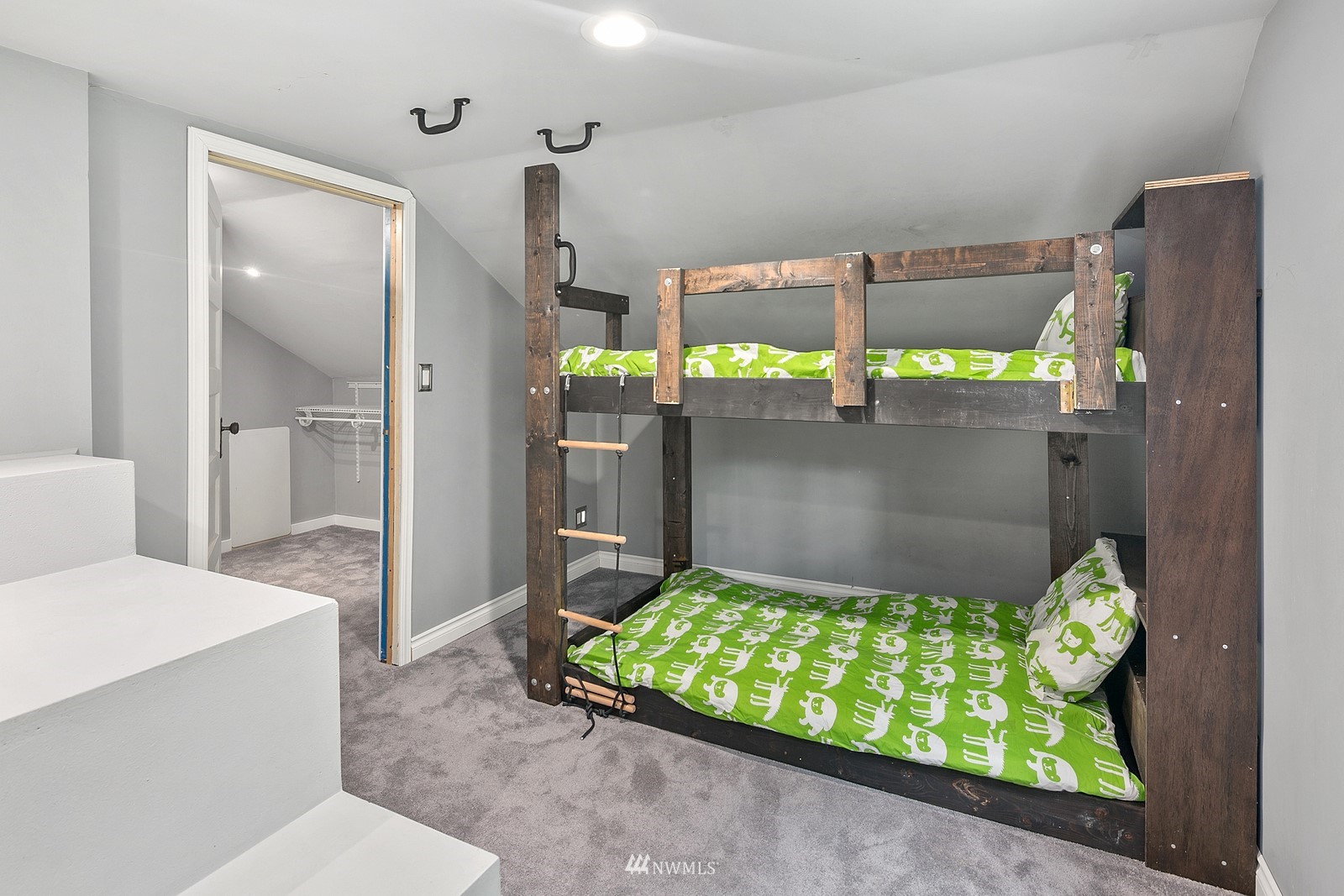 18416 Southeast Petrovitsky Road Renton, WA 98058 - Photo 27 of 36 a bedroom with a bed and a table