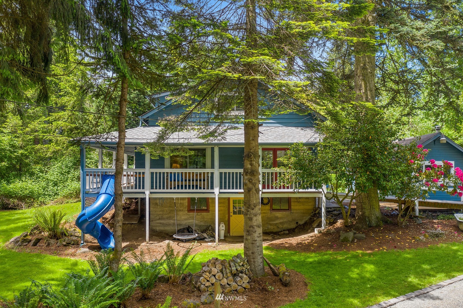 18416 Southeast Petrovitsky Road Renton, WA 98058 - Photo 32 of 36 a view of a chair and table in backyard of the house