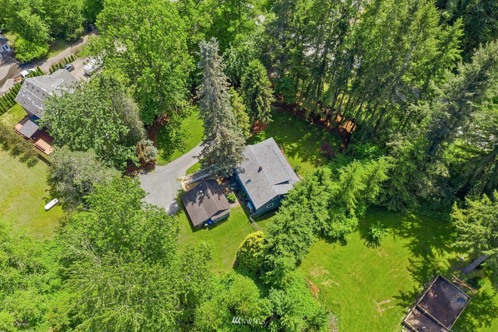 18416 Southeast Petrovitsky Road Renton, WA 98058 - Photo 34 of 36 an aerial view of a house with yard swimming pool and outdoor seating
