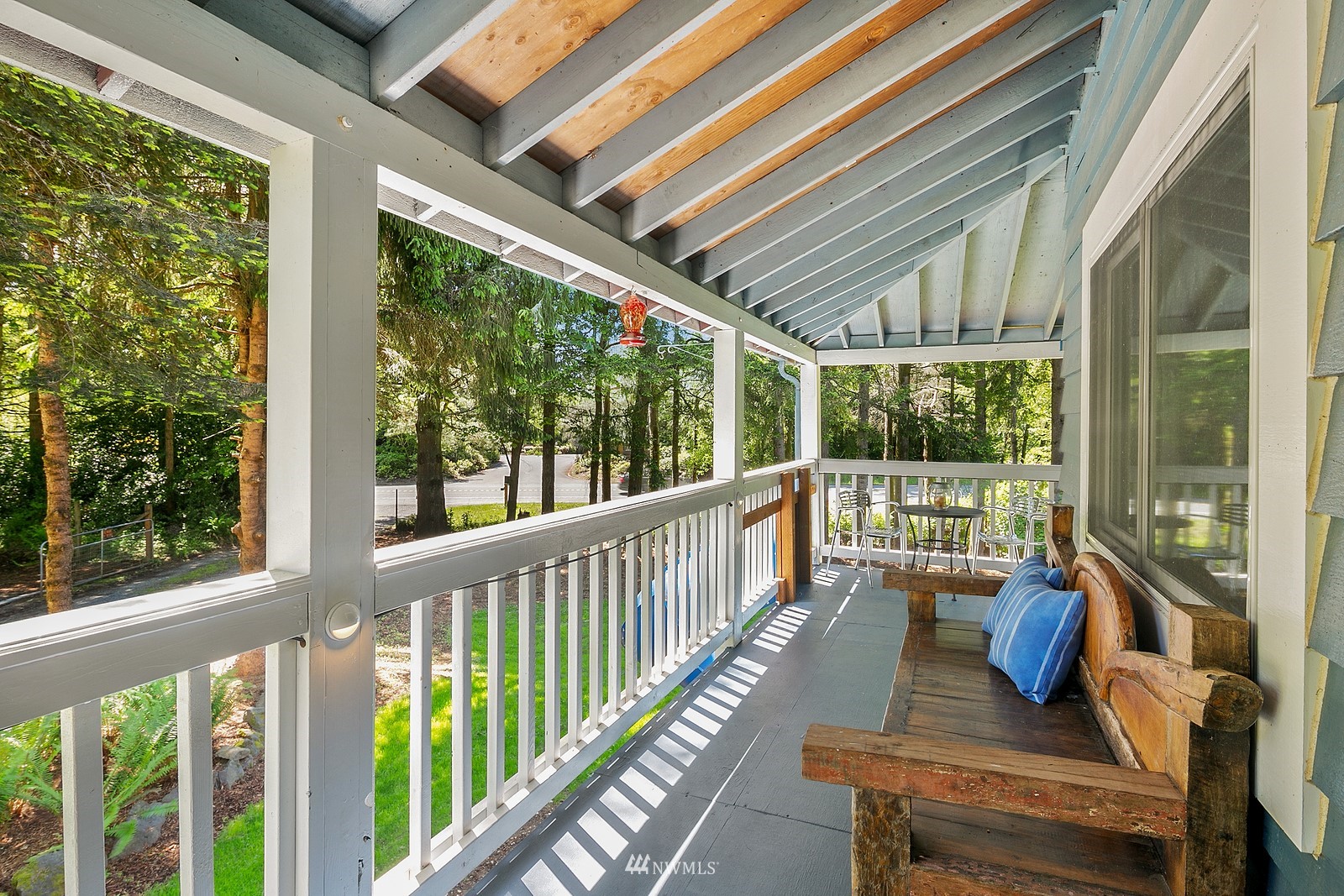 18416 Southeast Petrovitsky Road Renton, WA 98058 - Photo 5 of 36 a view of a porch with wooden floor