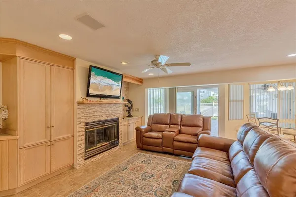 a spacious bedroom with a bed and a dresser