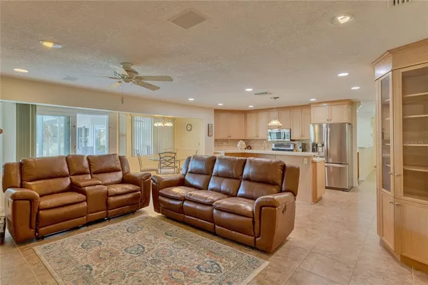 a view of walk in closet with clothes
