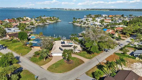 a living room with furniture wooden floor and window